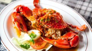cooked crabs spicy sauce on white | Mouth-Watering Crab Recipes You Need To Try | featured