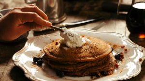 YpngzEY9ijY-pancake with butter on white ceramic plate-healthy breakfast recipes-us-feature