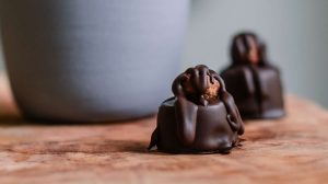 Two Chocolate Bites on Top of Brown Table-best dark chocolate-px-feature