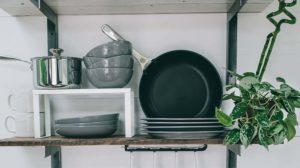 pans and plates on rack | Discount Cookware You Must Grab on Cyber Monday | Featured
