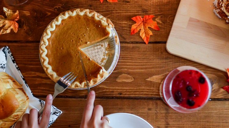 XQ5QWR8eZ5I-slicing pumpkin pie-vegan thanksgiving recipes-us-feature