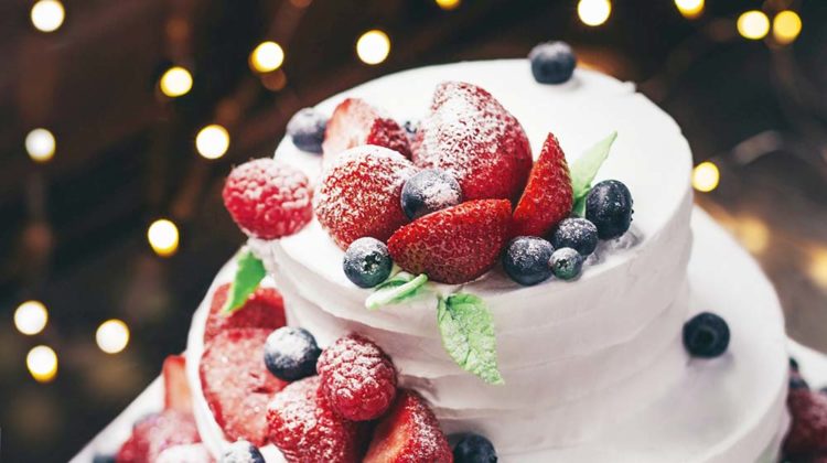 close up photography tier vanilla cake with blueberry and strawberry | Winter Cakes You Must Try This​ Winter​ Season | Featured