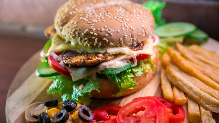 J9lD6FS6_cs-hamburger with vegetables and meat beside French fries-easy vegetarian recipes-us-feature