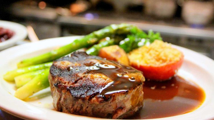 selective focus photography of beef steak with sauce-oven baked pork chops-px-feature