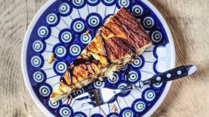 9IhPoezzwq8-sliced pie on plate beside ford on table-pancake casserole-us-feature