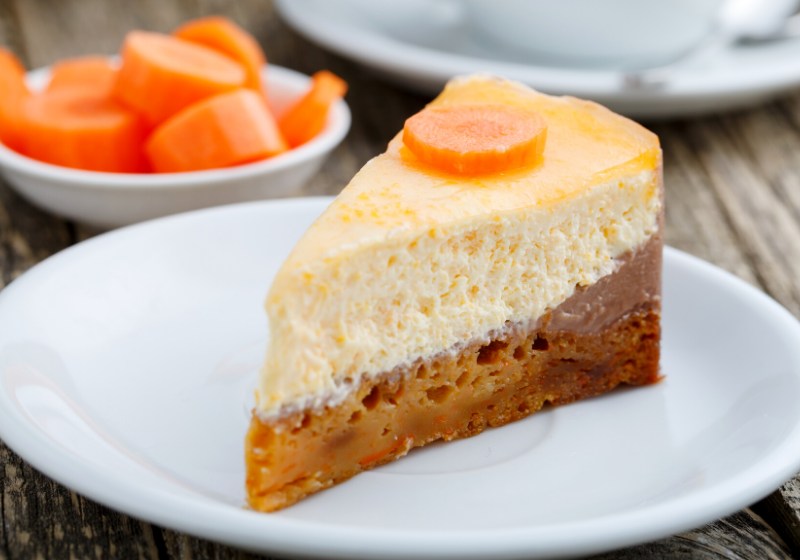 slice vegetarian carrot cake on white | easter dinner recipes