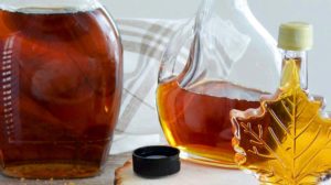 maple filled bottle on the table | Alternative Maple Syrup Uses For A Happy Autumn | Featured