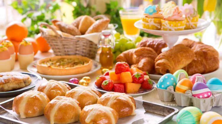Breakfast or brunch table filled with all sorts of delicious delicatessen ready for an Easter meal | Tasty Easter Brunch Ideas To Make For Family and Friends | easter brunch menus | Featured