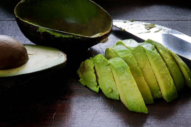 peeled-ripe-avocado-on-chopping-board | avocadoes