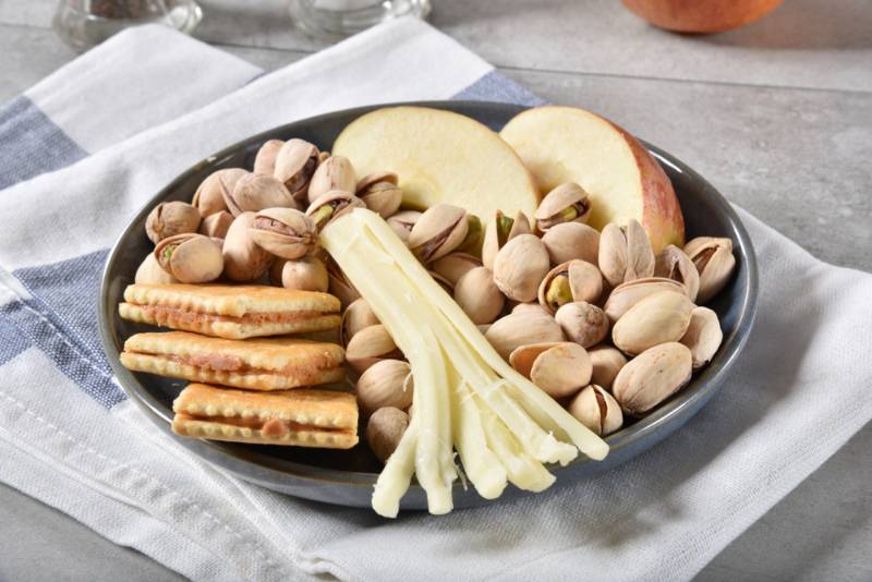 plate-crackers-peanut-butter-pistachios-string | Mozzarella