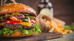 close home made tasty burgers | 13 Labor Day Recipes You Can Cook To Celebrate The Holiday | Featured