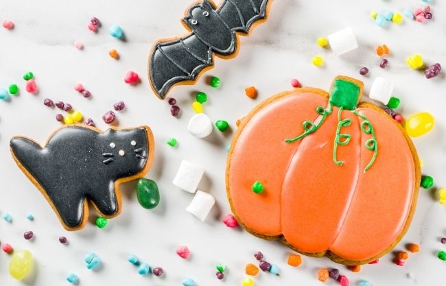 Traditional Halloween baked pastry, funny cookies and candies for children's treat - ghost, pumpkins, black cat, bats, witch house | cookie recipes