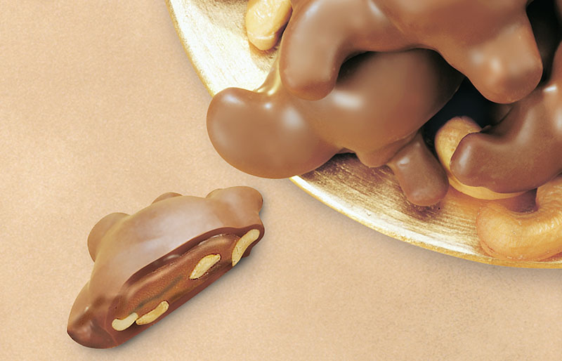milk chocolate cashew clusters on gold | valentine chocolate recipe