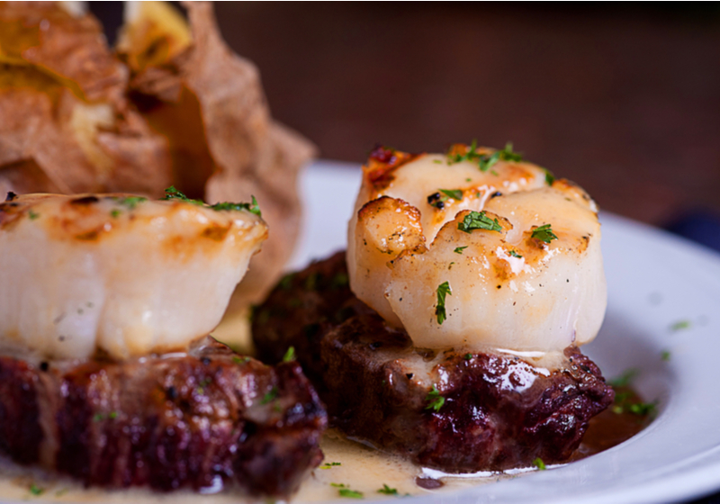 Surf and Turf _ Steak and Scallop _ First Date Dinner Recipes _ Date Night Dinner Ideas _ Plated Tenderloin Fillet Mignon Topped With Scallops