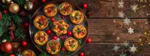 a platter of colorful mini vegetarian quiches garnished with festive herbs and spices, displayed on a rustic wooden table.