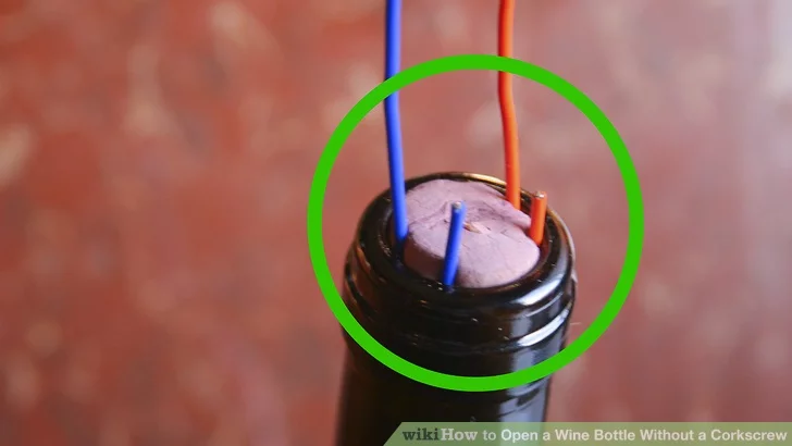 use paperclips to open wine bottle, see more at https://homemaderecipes.com/course/drinks/how-to-open-a-wine-bottle-without-a-corkscrew